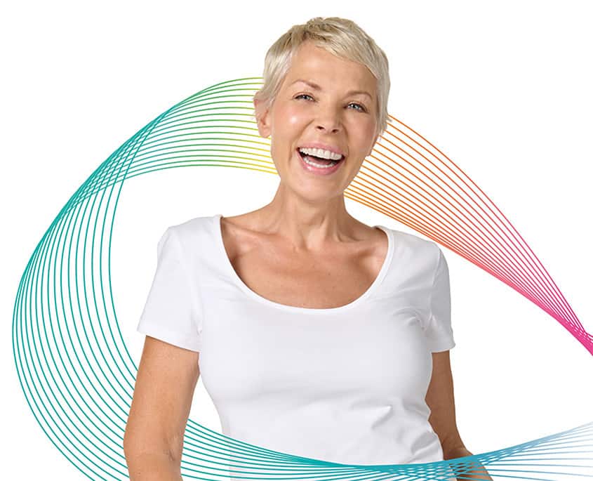 Women smiling Colgate Total